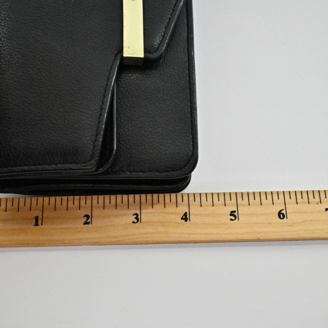 Lynn's Closet Boutique Kate Spade black pebbled leather crossbody bag with gold-tone metal bar detail and ruler scale