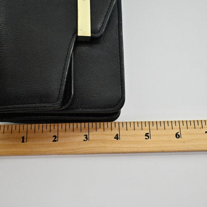 Lynn's Closet Boutique Kate Spade black pebbled leather crossbody bag with gold-tone metal bar detail and ruler scale