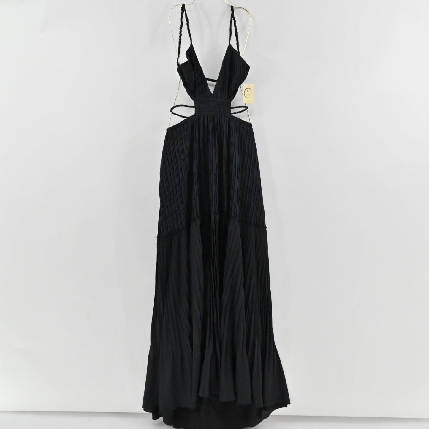 Lynn's Closet Boutique black Jonathan Simkhai floor-length gown with pleated texture, V-neck, and side cut-outs.