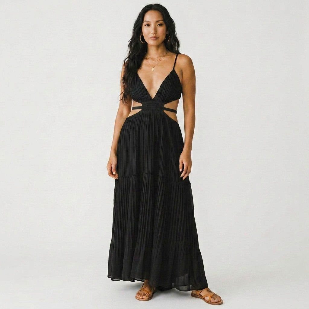 Model wearing a Lynn's Closet Boutique black Jonathan Simkhai pleated floor-length gown with side cut-outs