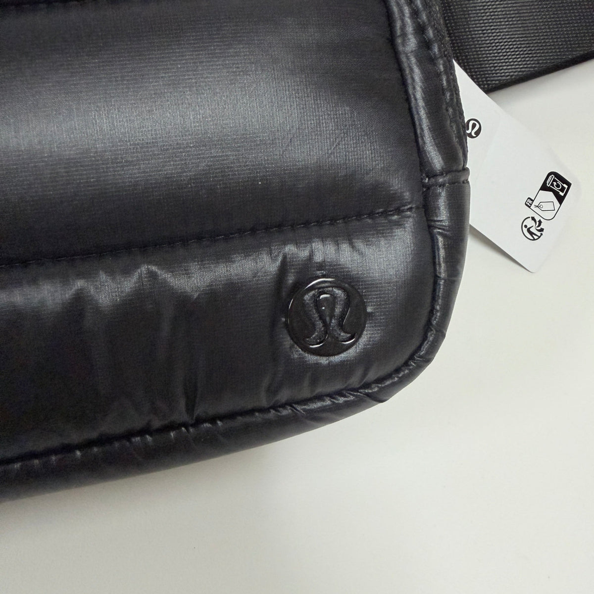 Lynn's Closet Boutique Lululemon Everywhere Belt Bag in black puffer material with signature logo and tag