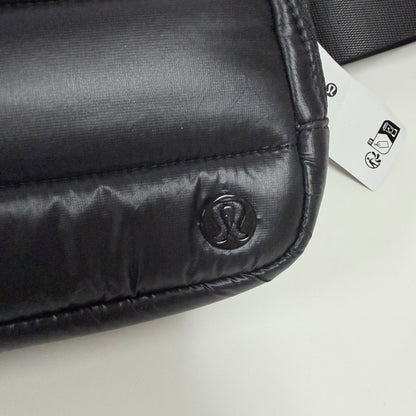 Lynn's Closet Boutique Lululemon Everywhere Belt Bag in black puffer material with signature logo and tag