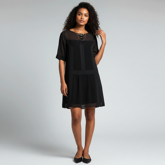 Model wearing a black BCBGMaxAzria Runway shift dress with sheer panels and elbow-length sleeves