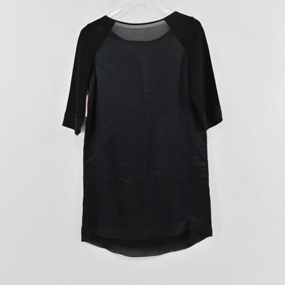 Lynn's Closet Boutique BCBGMaxAzria Runway black shift dress with sheer panels and elbow-length sleeves
