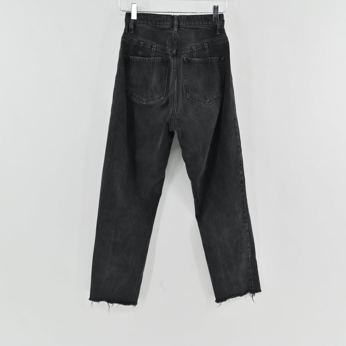 Lynn's Closet Boutique Free People black wash high-rise straight-leg jeans with back pockets and raw frayed hem