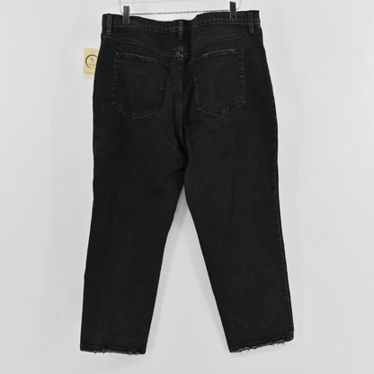 Lynn's Closet Boutique Abercrombie & Fitch black denim ankle straight jeans with a distressed hem, back view.
