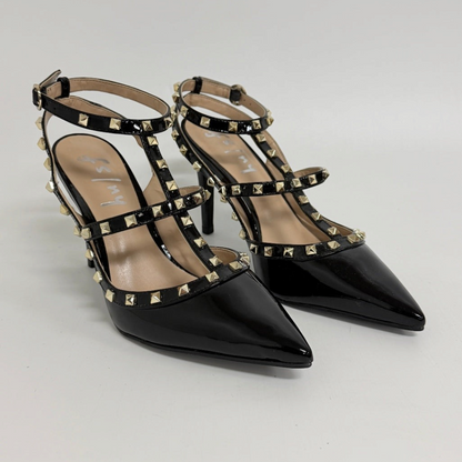Lynn's Closet Boutique FS/NY black patent pointed-toe heels with gold pyramid studs and multi-strap cage design.