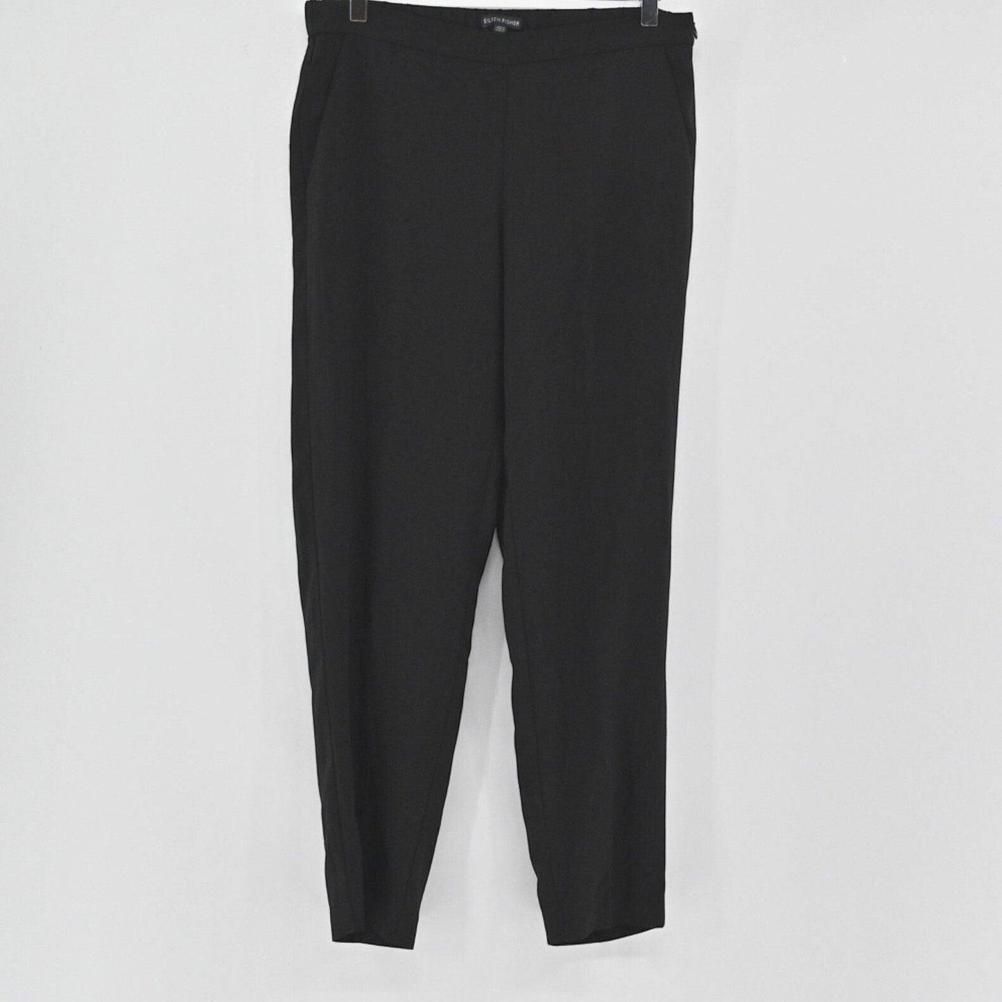 Lynn's Closet Boutique Eileen Fisher black tapered ankle pants with a clean waistband and side pockets.