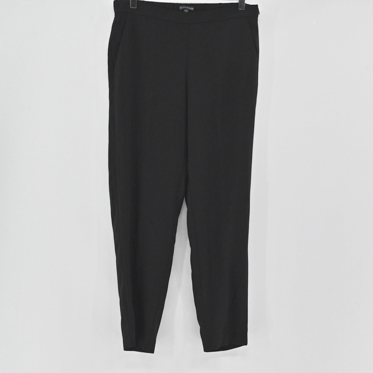 Lynn's Closet Boutique Eileen Fisher black tapered ankle pants with a clean waistband and side pockets.