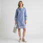 Lynn's Closet Boutique Carlisle NY blue chambray dress with white collar, embroidered sleeves, and lace trim details.