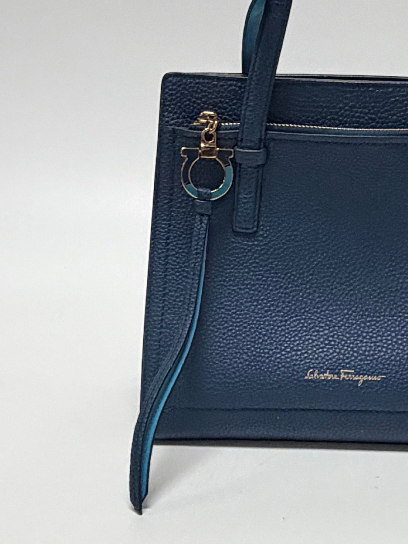 Lynn's Closet Boutique Salvatore Ferragamo Amy blue pebbled leather tote bag with gold Gancini charm detail