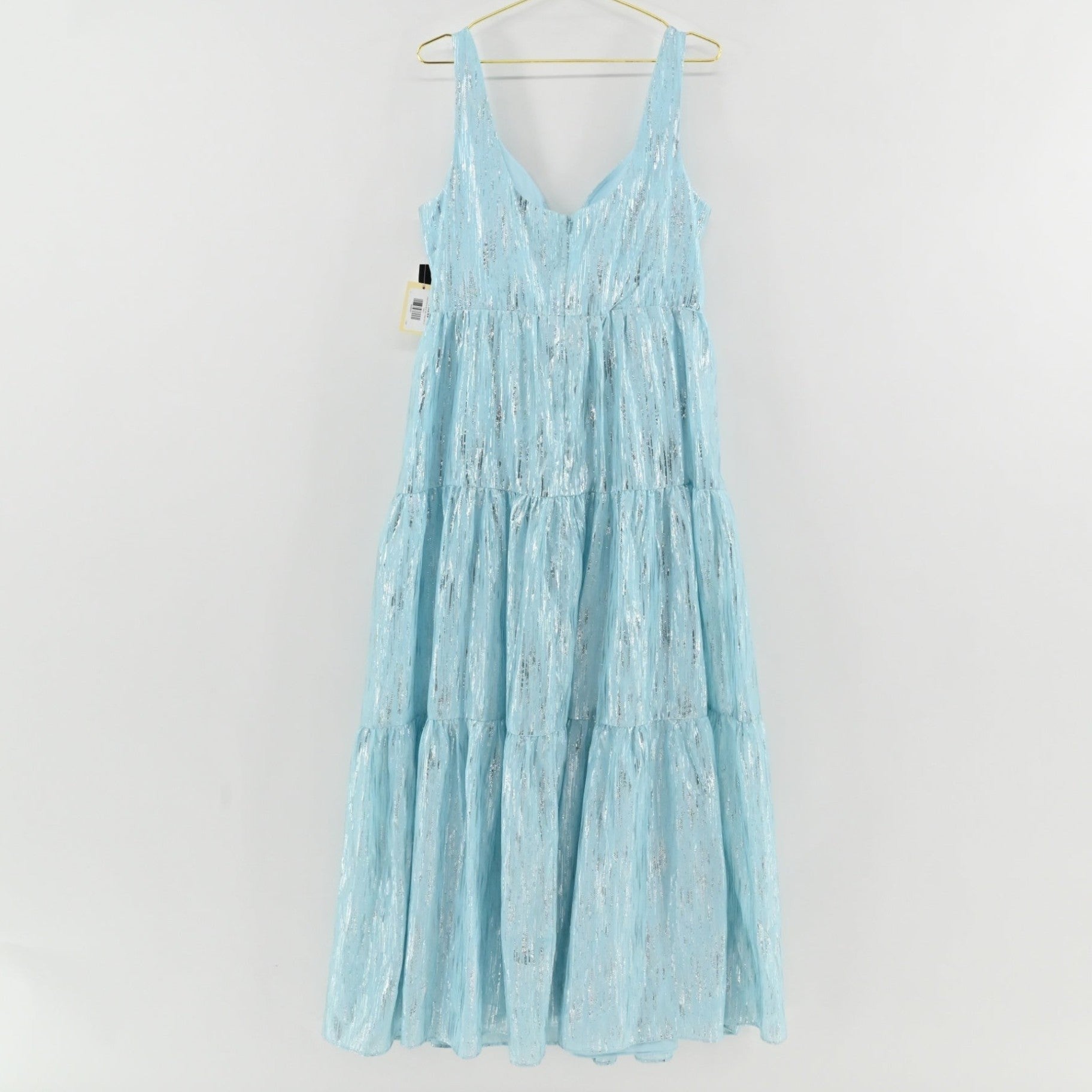 Lynn's Closet Boutique sky blue metallic tiered maxi dress with V-neckline and sleeveless bodice.