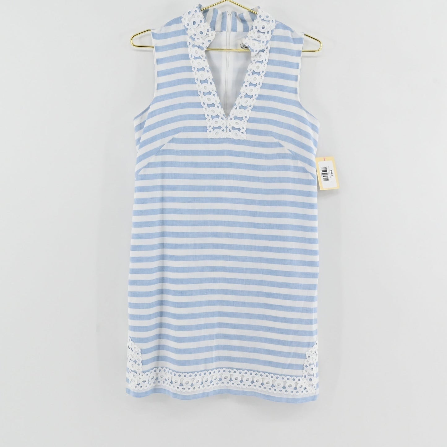 Lynn's Closet Boutique Eliza J sleeveless blue and white striped shift dress with white eyelet lace trim.