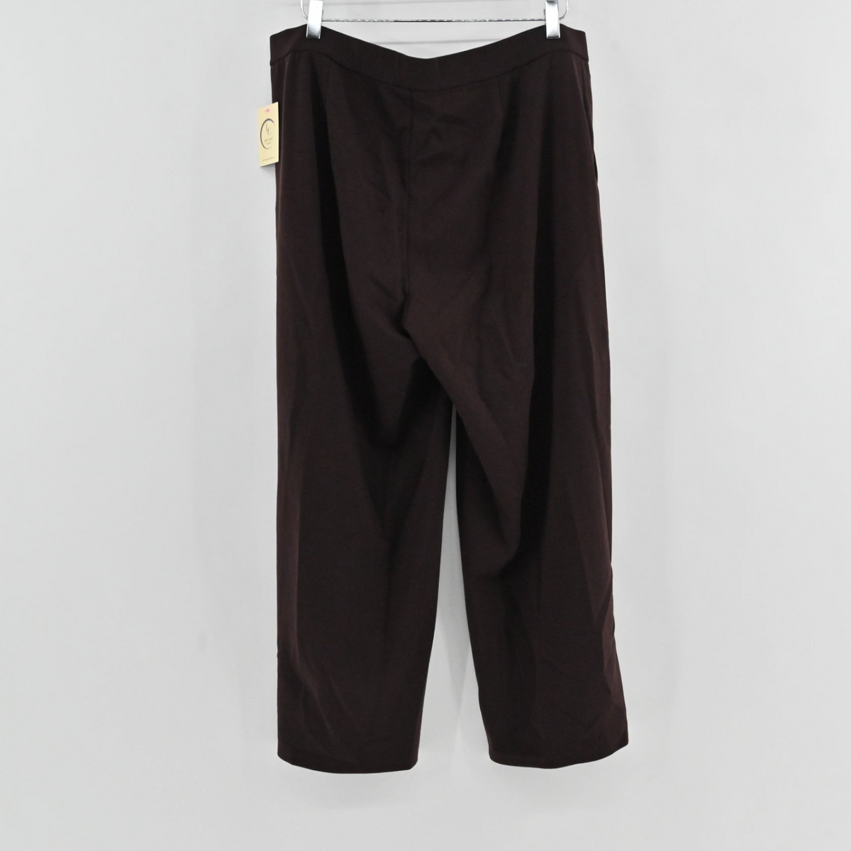 Lynn's Closet Boutique Eileen Fisher brown wide-leg knit pants hanging on a hanger against a white background