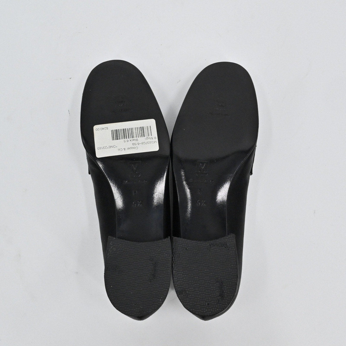 Lynn's Closet Boutique Bruno Magli black satin loafers showing the smooth soles and low block heels from below
