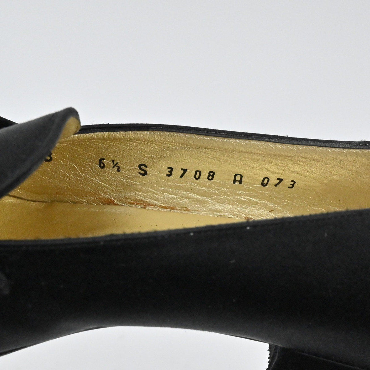 Lynn's Closet Boutique Bruno Magli black satin loafer interior showing size 6.5 and model number stamping