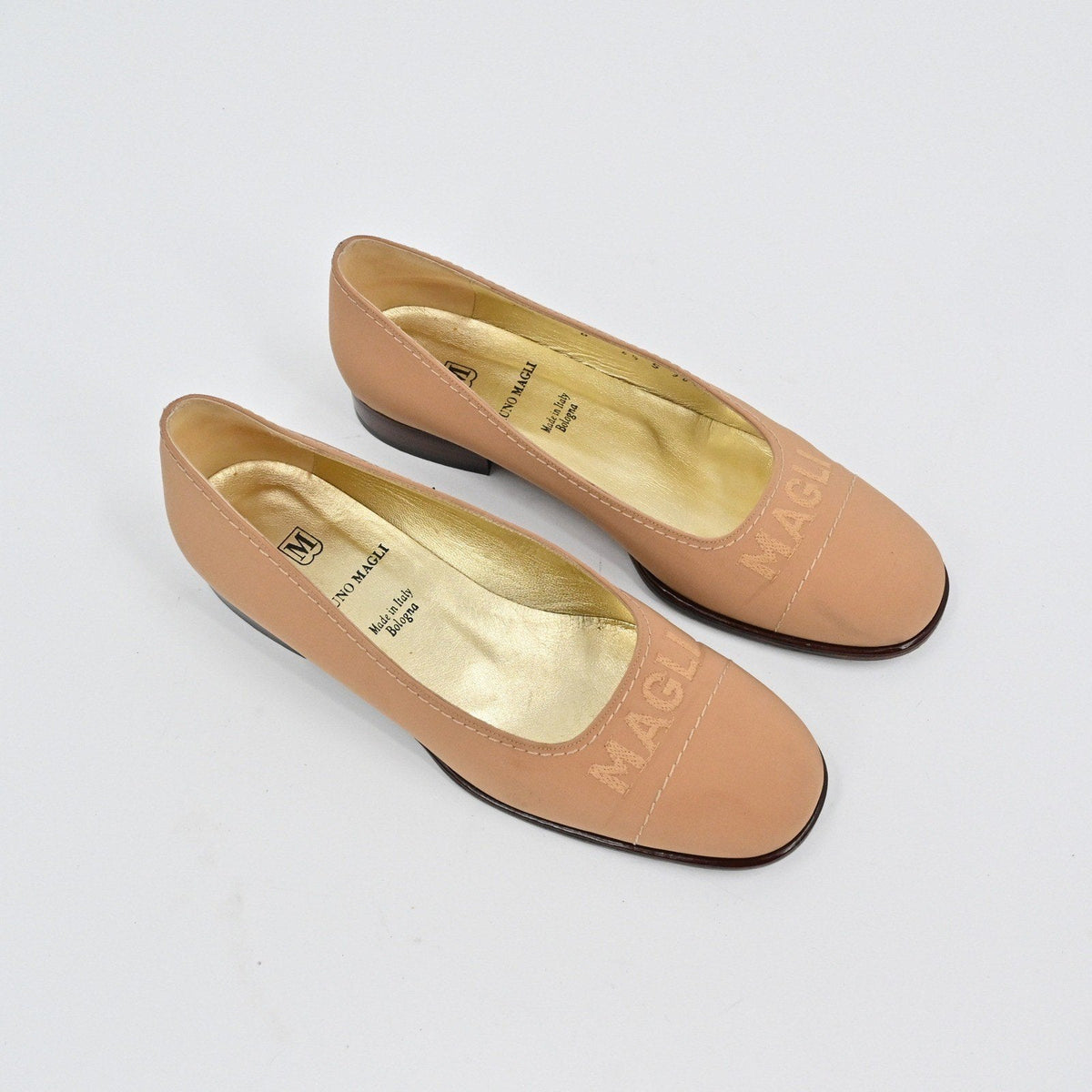 Lynn's Closet Boutique Bruno Magli tan leather loafer pumps with low heels and embossed logo detail