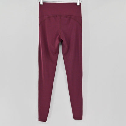 Lynn's Closet Boutique Maaji Vienna Balcony Dazeful high-waisted leggings in deep burgundy moisture-wicking fabric.