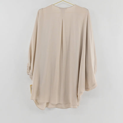 Lynn's Closet Boutique champagne silk top with a relaxed fit, billowy sleeves, and a back pleat, hanging view.