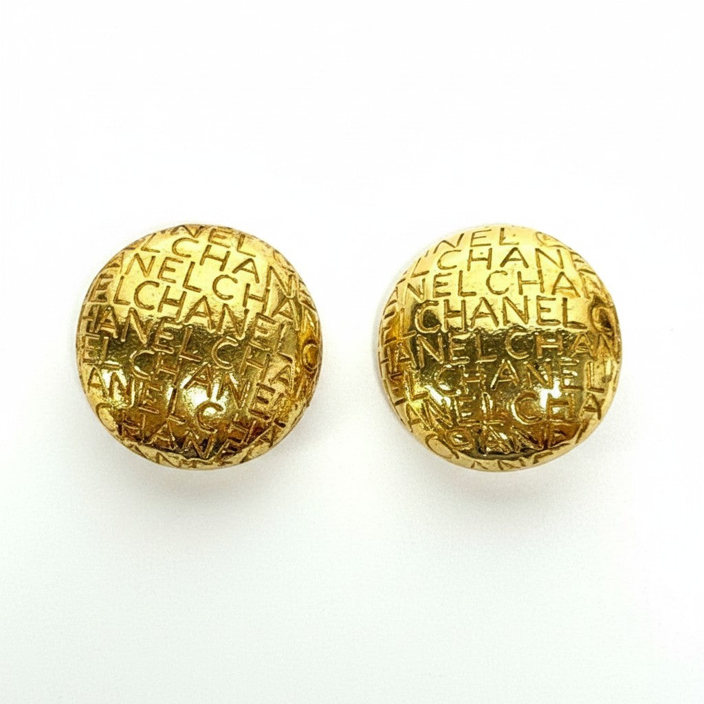 Lynn's Closet Boutique Vtg 80/90s Chanel clip-on gold earrings with repeating logo pattern.