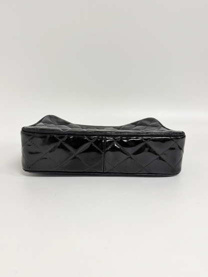 Lynn's Closet Boutique black quilted patent leather Chanel camera bag base view showing diamond stitching pattern