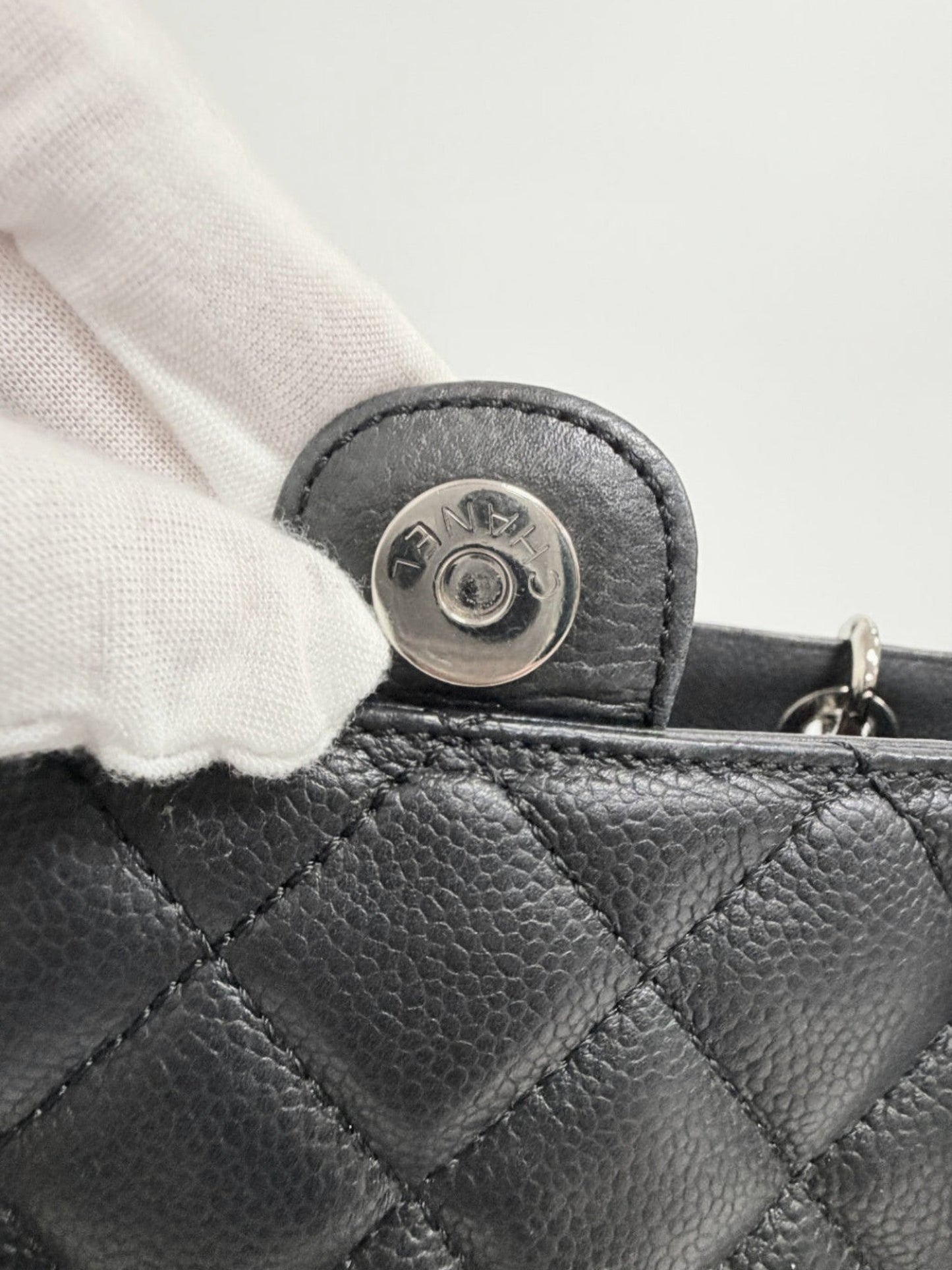 Lynn's Closet Boutique Chanel Petite Shopping Tote featuring a silver-tone magnetic snap closure on black caviar leather