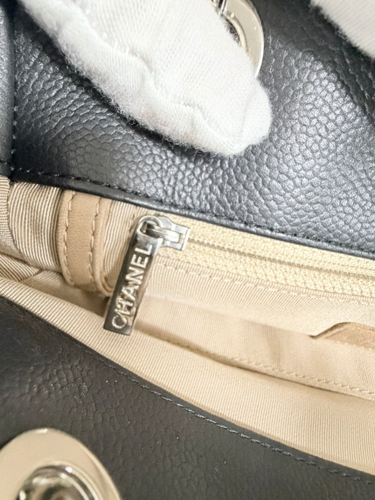 Lynn's Closet Boutique Chanel Petite Shopping Tote interior featuring a silver Chanel branded zipper pull
