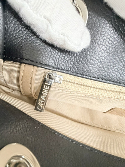 Lynn's Closet Boutique Chanel Petite Shopping Tote interior featuring a silver Chanel branded zipper pull