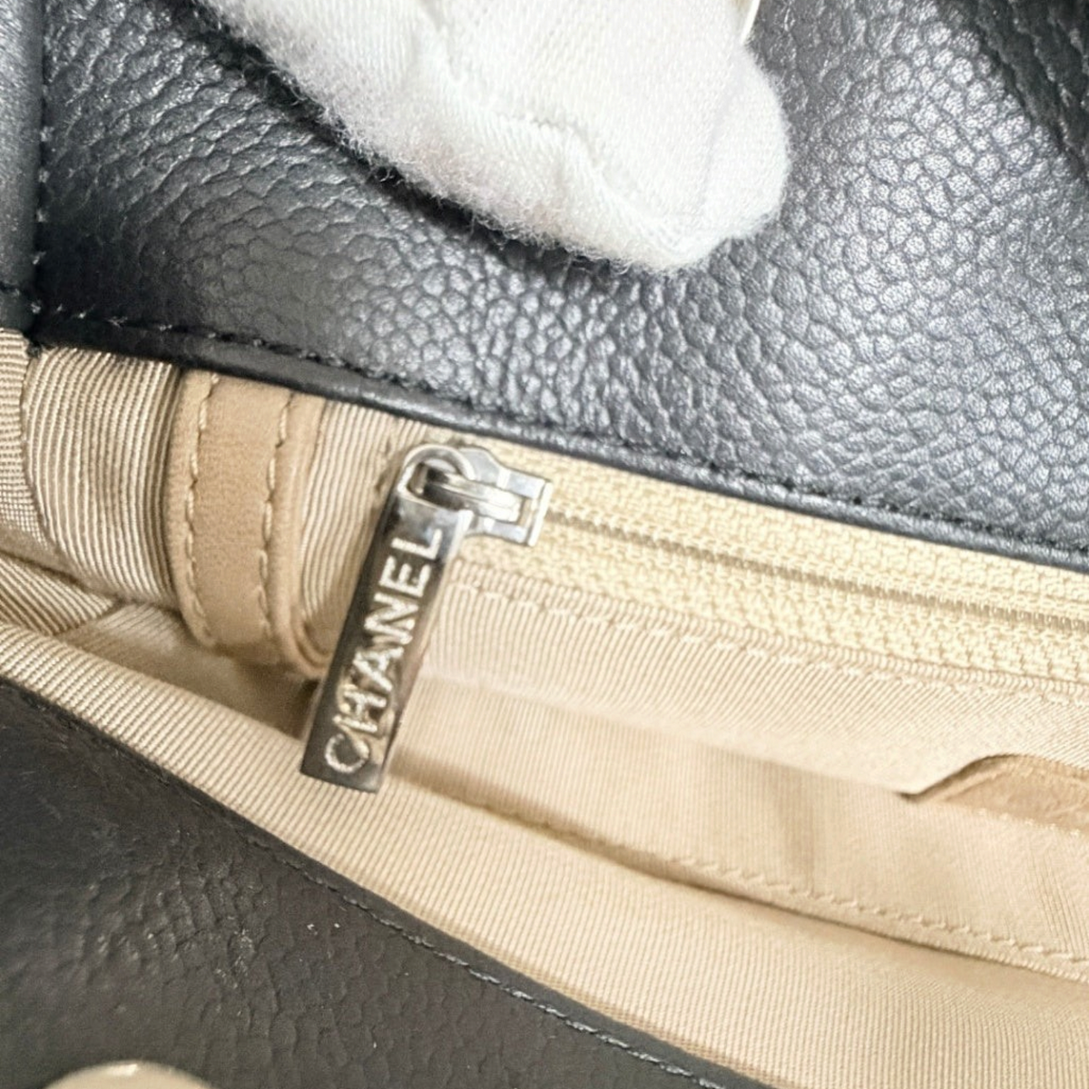 Lynn's Closet Boutique Chanel Petite Shopping Tote interior featuring a silver Chanel branded zipper pull
