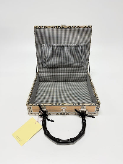 Open Lynn's Closet Boutique Braciano cigar box purse with black bamboo handle and gingham fabric interior lining.