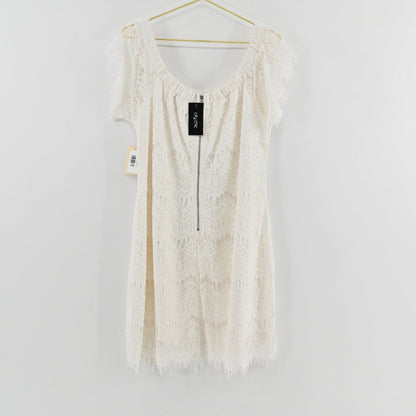 Lynn's Closet Boutique City Chic white lace off-the-shoulder dress with short sleeves and scalloped hem, size 16.