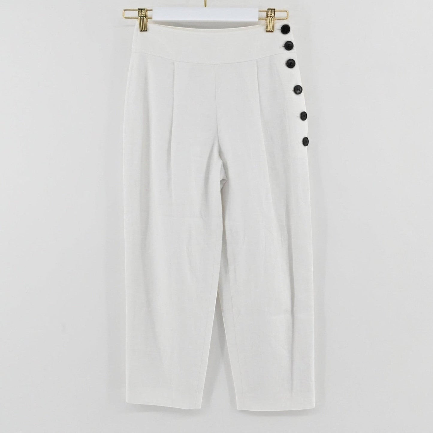 Lynn's Closet Boutique Club Monaco white linen-blend cropped pants with high waist and side button detail.