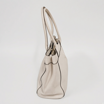 Lynn's Closet Boutique Coach Casey tote bag in chalk crossgrain leather, side view showing structured silhouette.