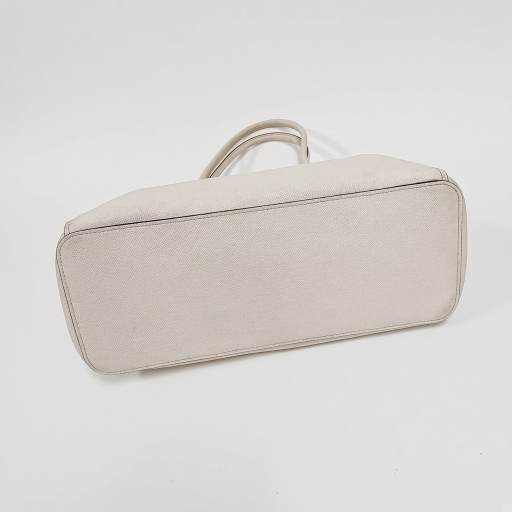 Lynn's Closet Boutique Coach Casey tote bag in chalk crossgrain leather, bottom view showing structured base