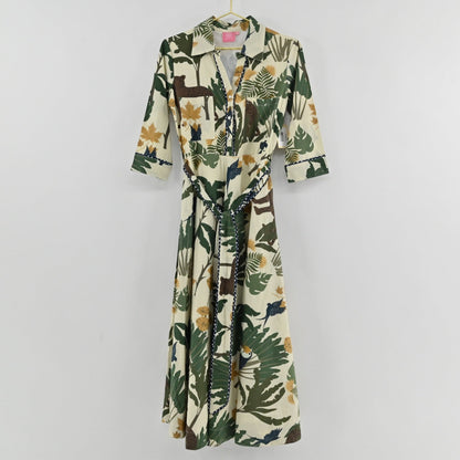 Lynn's Closet Boutique Just Darviny midi shirt dress in cream with tropical foliage, wildlife print, and contrast trim.
