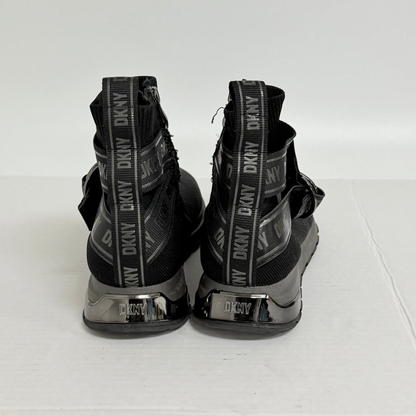 Lynn's Closet Boutique black DKNY Miley high-top sneakers featuring logo-branded heel pulls and lugged rubber outsoles.