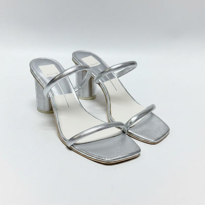 Lynn's Closet Boutique Dolce Vita silver metallic square-toe block heel sandals with dual tubular straps.