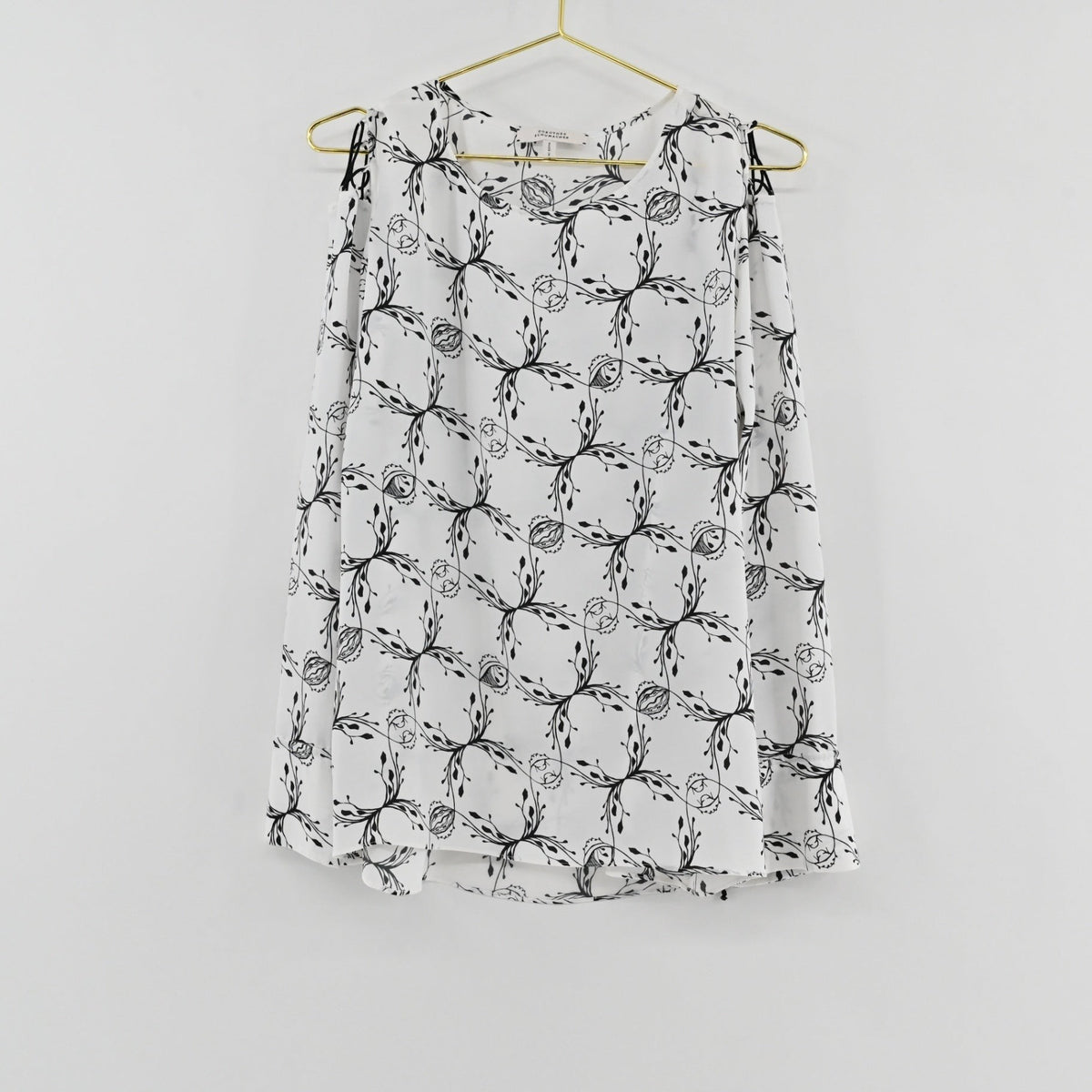 Lynn's Closet Boutique Dorothee Schumacher black and white botanical print cold-shoulder top with ribbon tie details