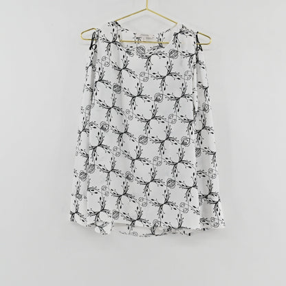 Lynn's Closet Boutique Dorothee Schumacher black and white botanical print cold-shoulder top with ribbon tie details