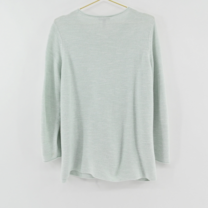 Lynn's Closet Boutique Eileen Fisher mint green textured crew neck sweater hanging on a gold hanger