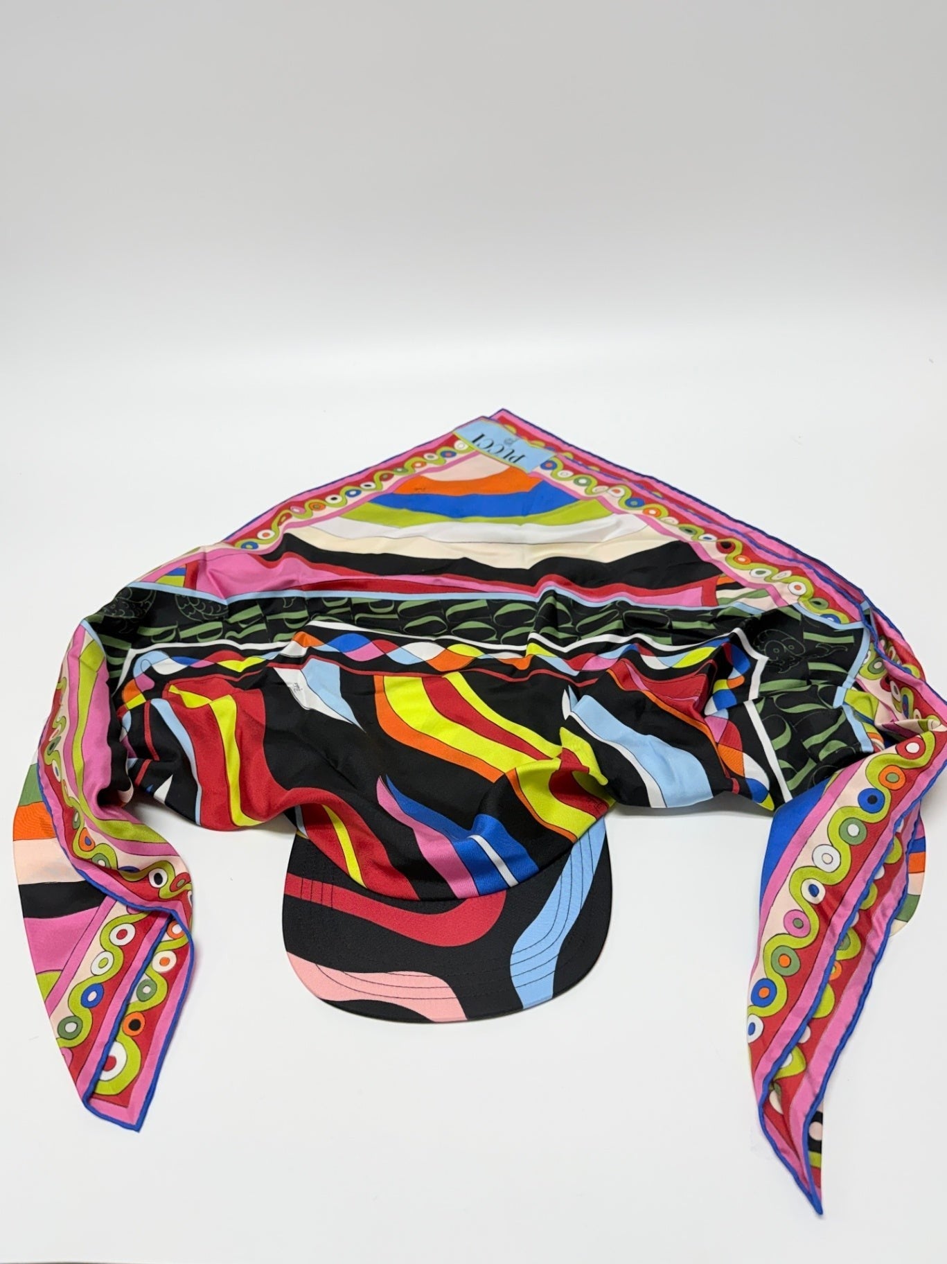 Lynn's Closet Boutique Emilio Pucci silk twill hat featuring a vibrant kaleidoscopic print in black, pink, and blue.