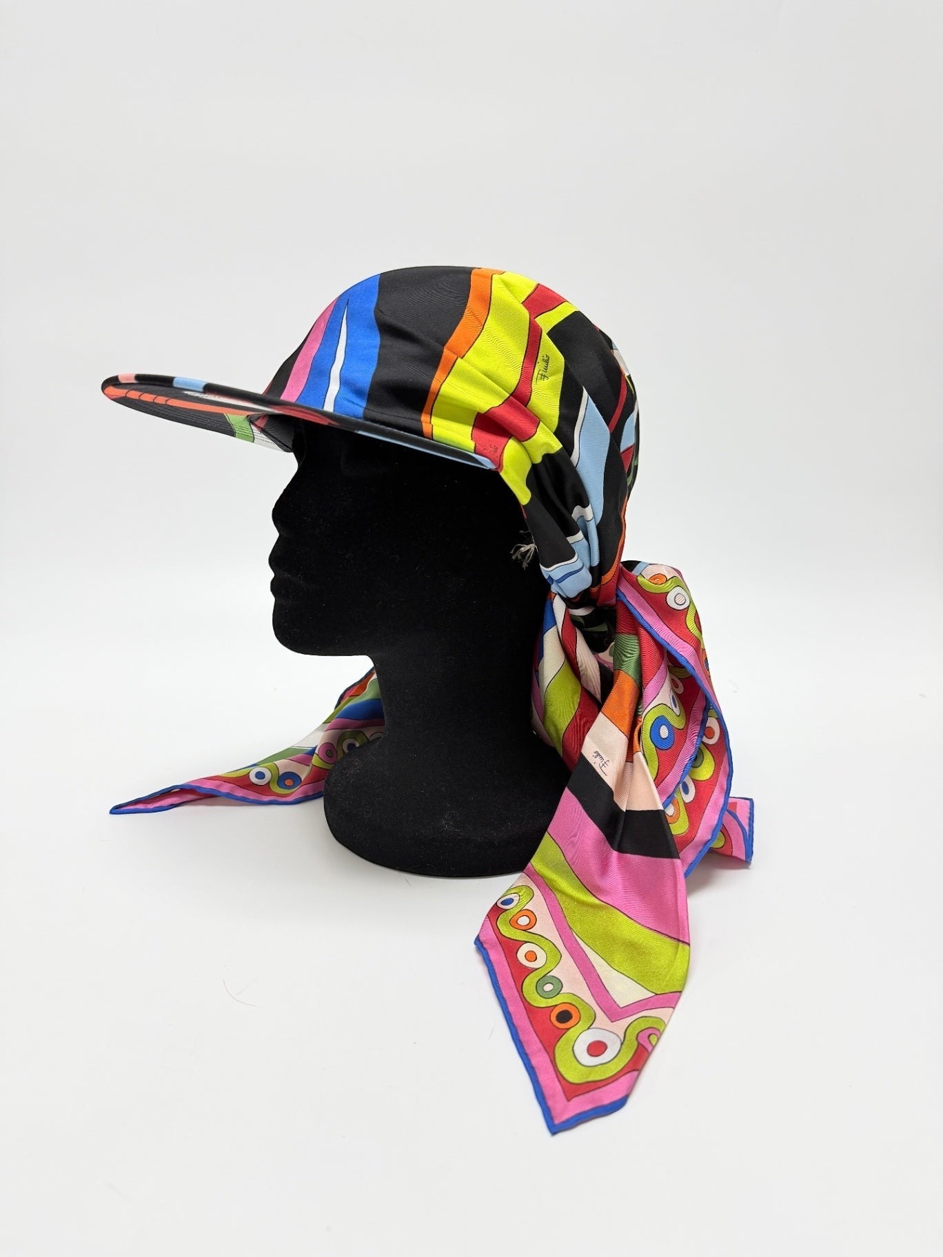 Lynn's Closet Boutique Emilio Pucci silk twill baseball cap with a vibrant kaleidoscopic print and scarf tie back.