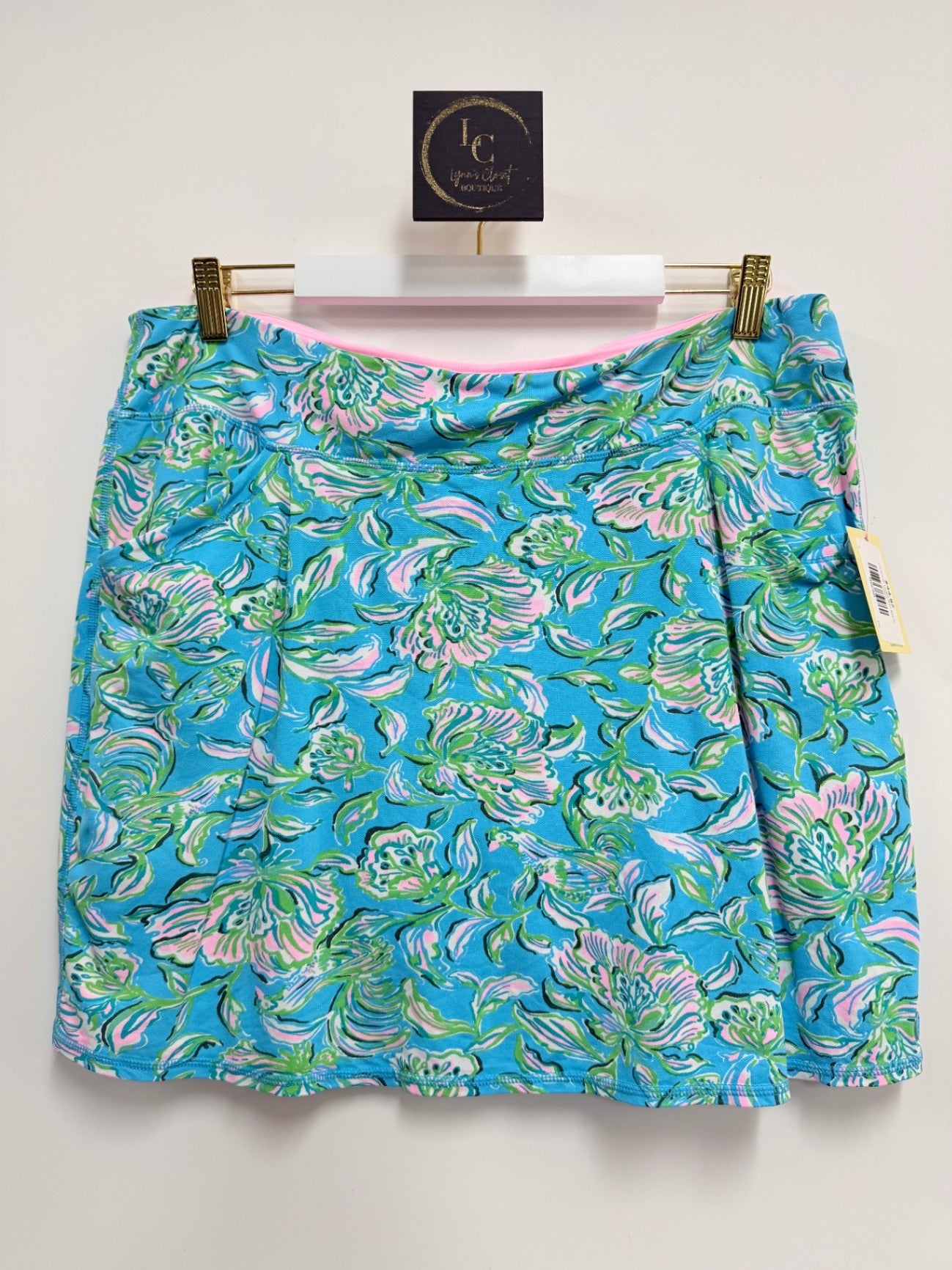 Lynn's Closet Boutique Lilly Pulitzer Luxletic skort in a vibrant turquoise, pink, and green floral print