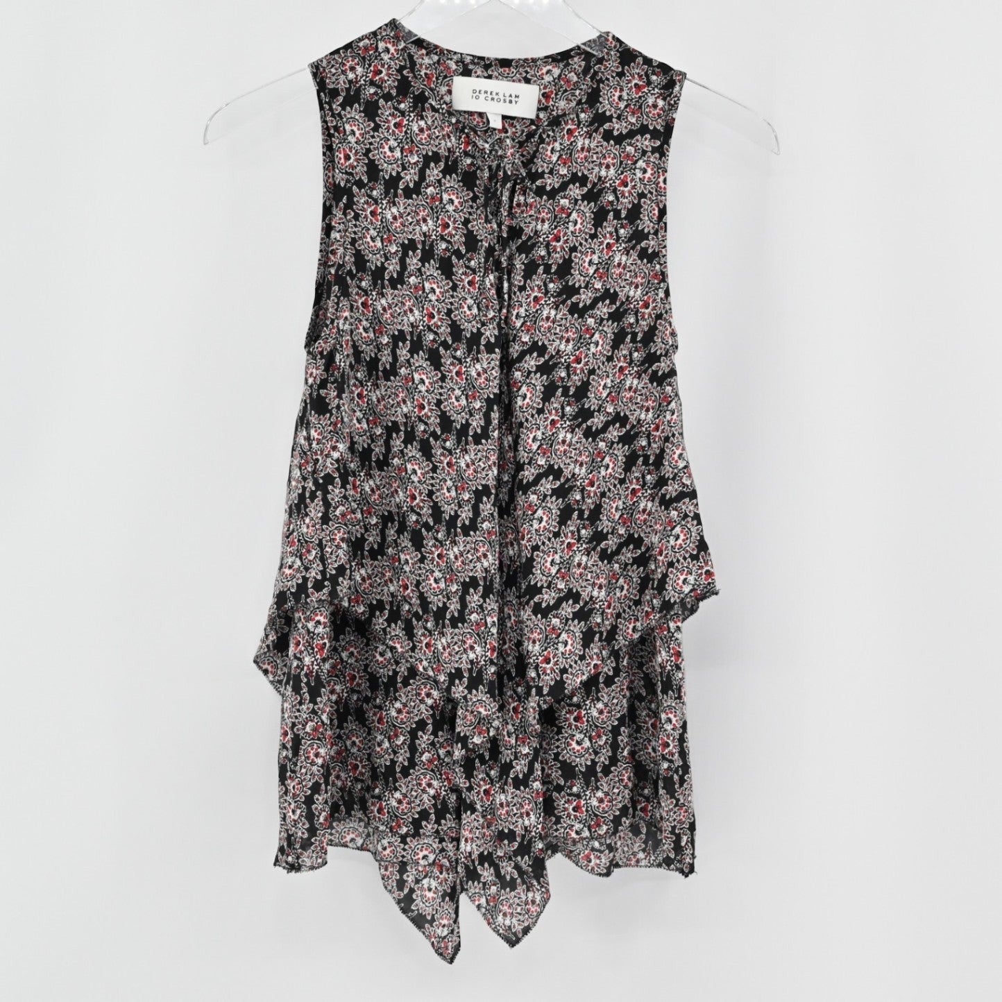 Lynn's Closet Boutique Derek Lam 10 Crosby sleeveless black silk top with multi-colored floral print and tiered ruffles.