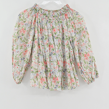 Lynn's Closet Boutique floral print smocked off-shoulder blouse with puff sleeves and elasticized cuffs.