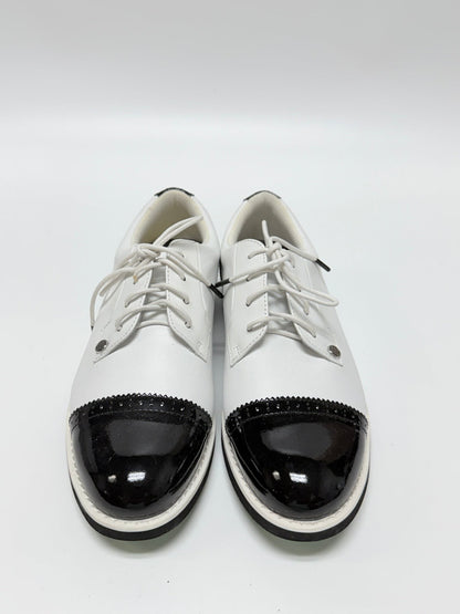 Lynn's Closet Boutique G/Fore Gallivanter white and black cap-toe golf shoes with brogue detailing, size 8.5.