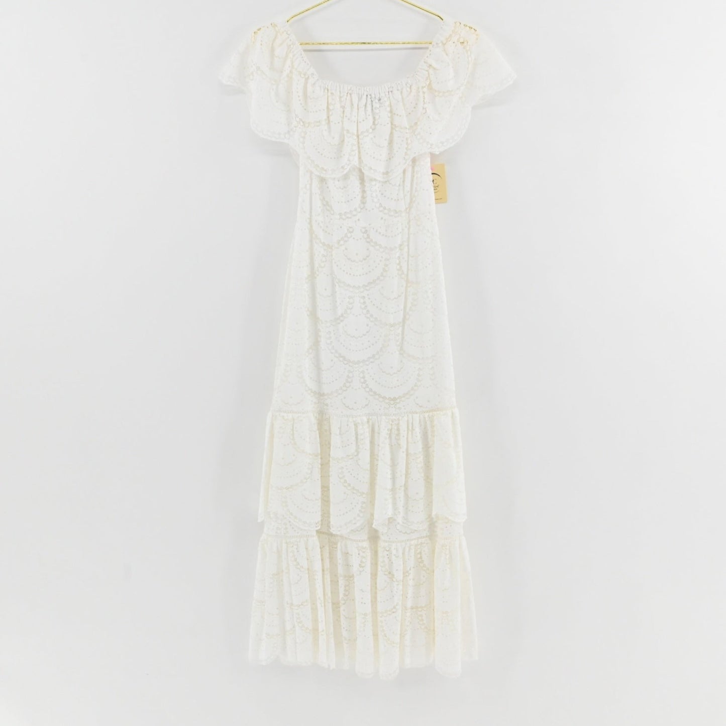 Lynn's Closet Boutique Gianni Bini white midi dress featuring scalloped lace, off-the-shoulder neckline, and tiered skirt.