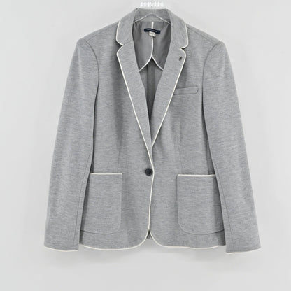 Lynn's Closet Boutique Tommy Hilfiger gray knit blazer with white contrast piping and single-button closure.