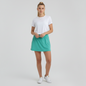 Lynn's Closet Boutique green Lilly Pulitzer athletic skort worn by a model with a white t-shirt and sneakers
