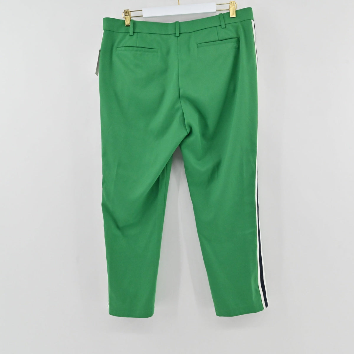 Lynn's Closet Boutique green Tory Burch Sport trousers featuring a side stripe and tailored fit on a white background.